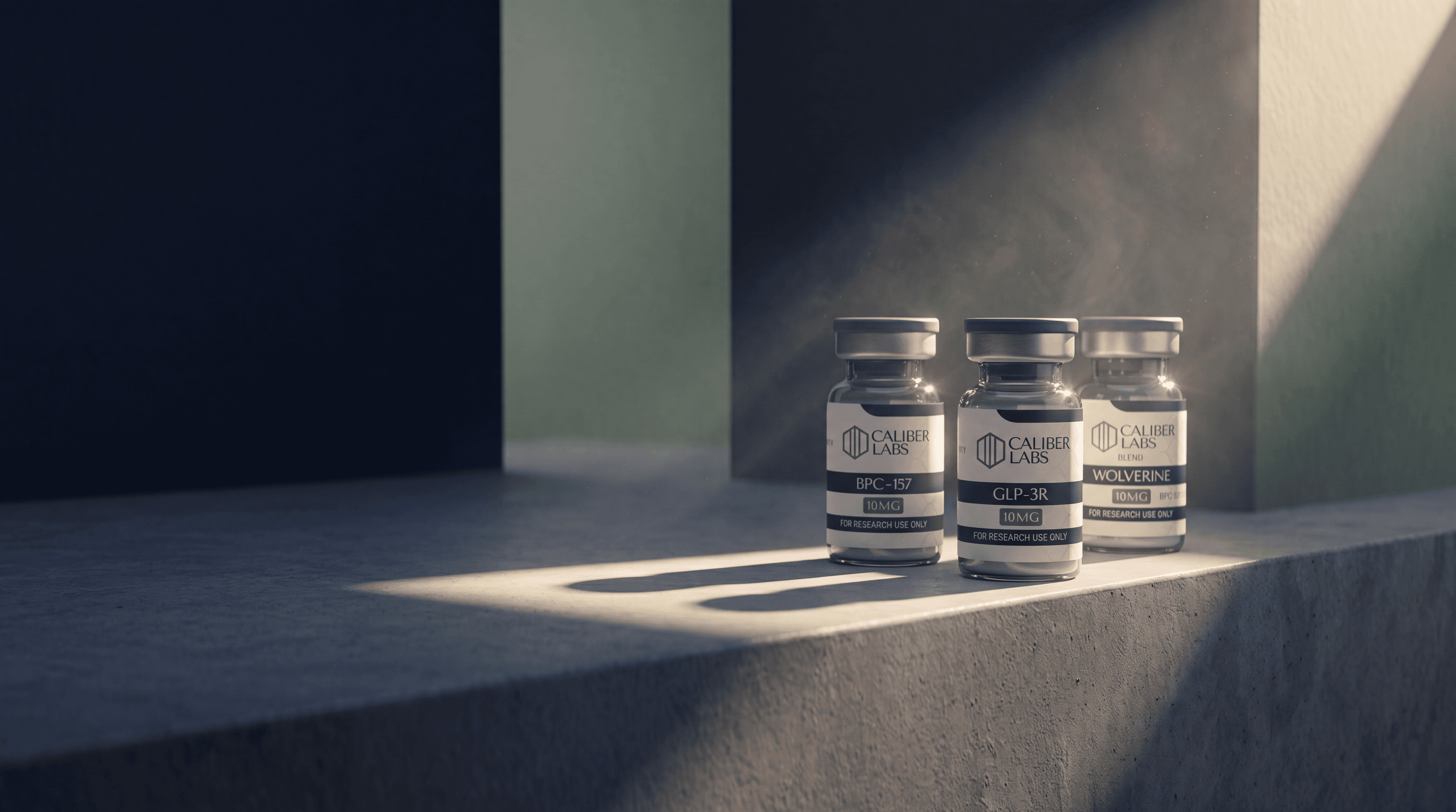 Caliber Labs research peptide vials — BPC-157, GLP-3R, and Wolverine Blend